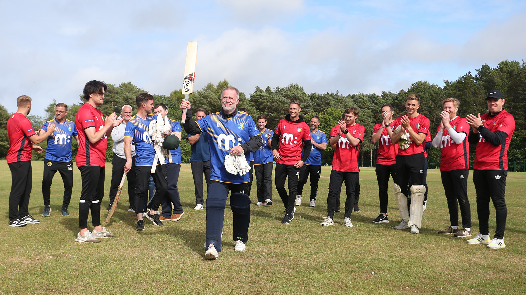 Craig Hignett takes the applause after his match winning half century